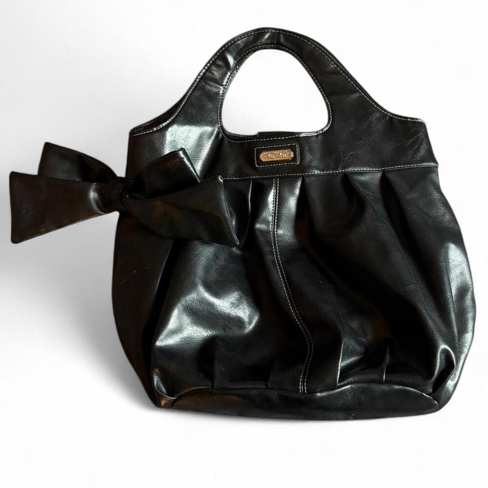 Black leather bow tote bag with silver hardware